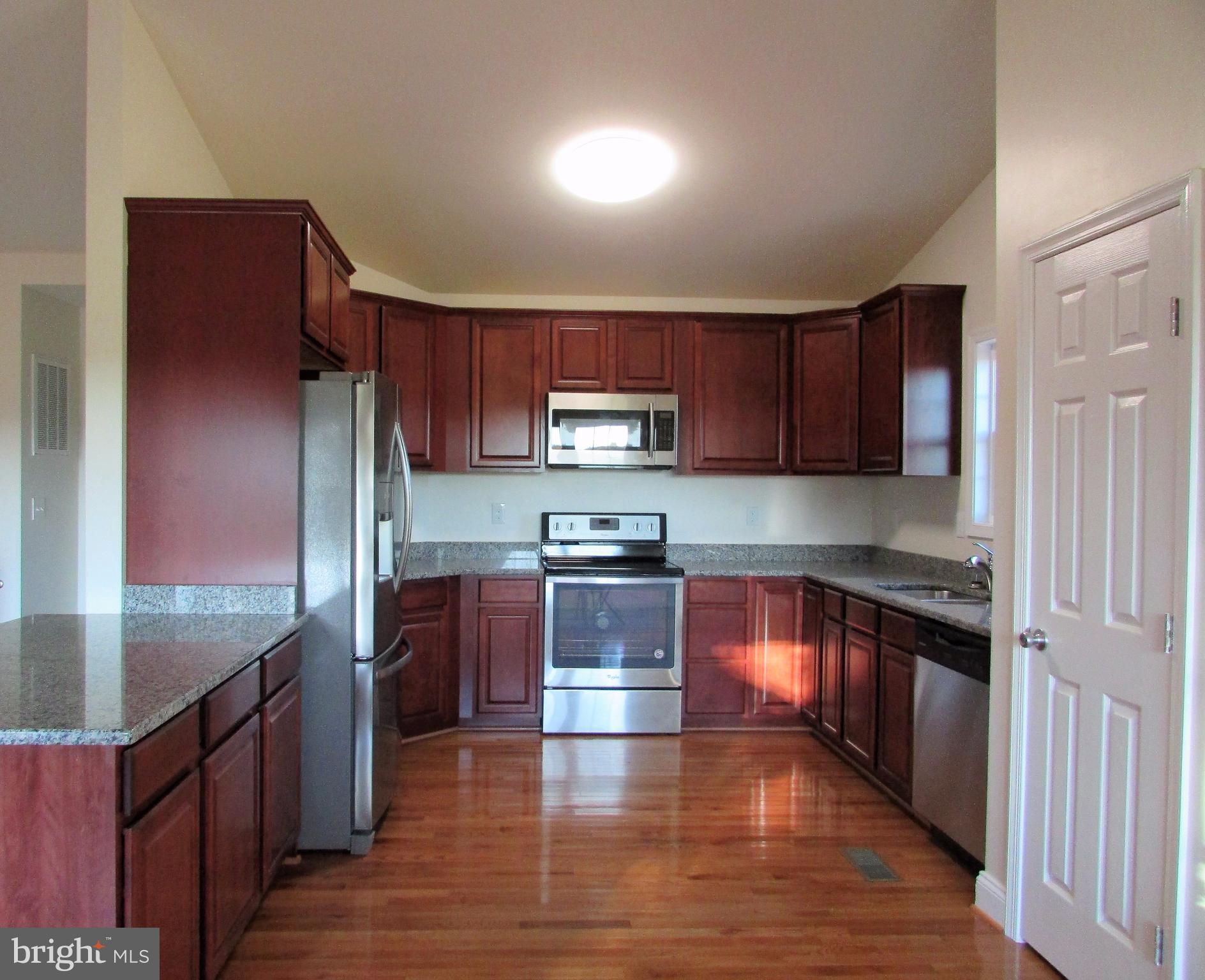 7400 Pine Stake Road Culpeper, VA 22701 - Photo 4 of 29 Kitchen w/SS Appliances & Breakfast Bar