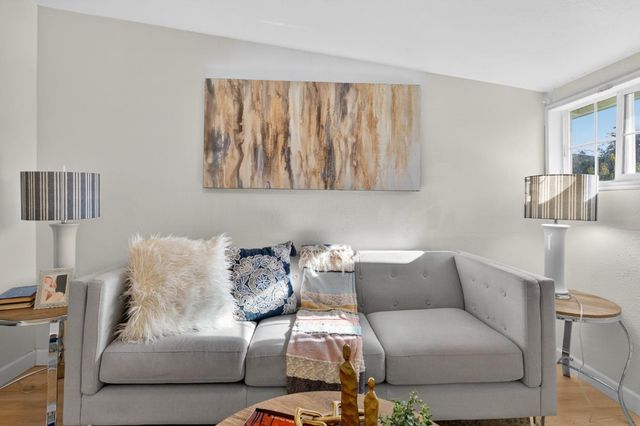 a living room with furniture and a couch