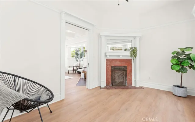 a view of a livingroom with furniture and a fireplace