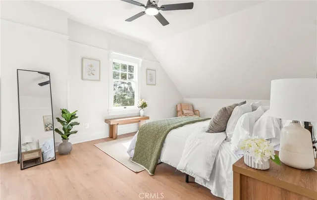 a bed room with a bed and a table