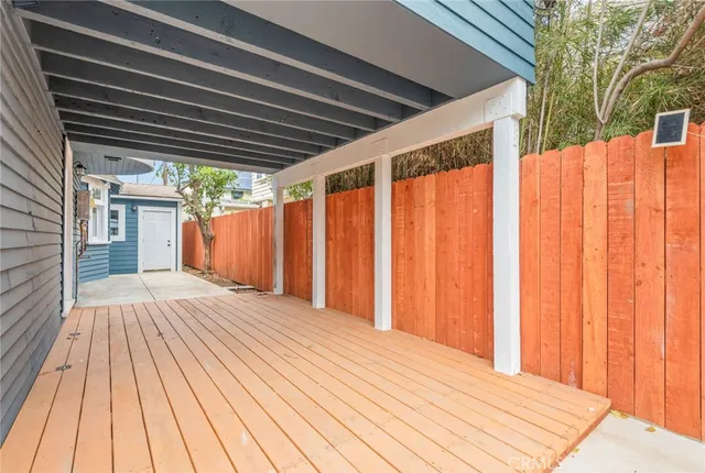 a view of a backyard of the house