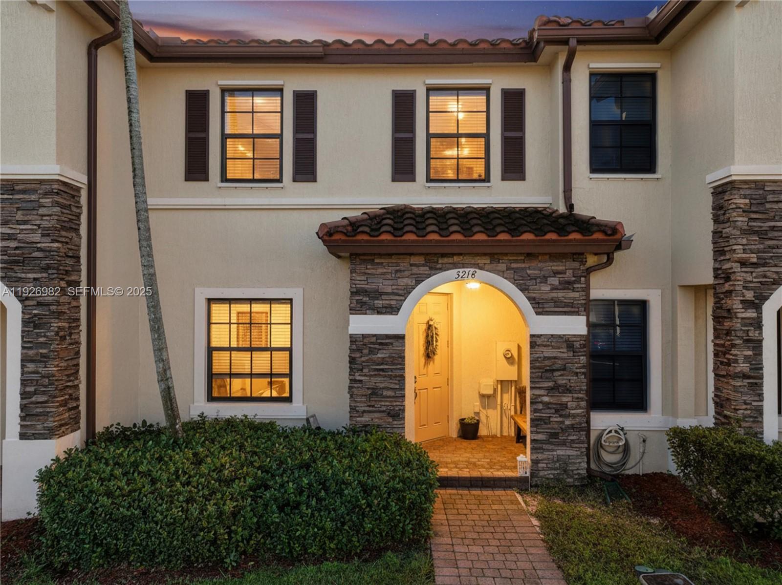 3218 Southeast 5th Court Homestead, FL 33033 - Photo 2 of 68 a front view of a house