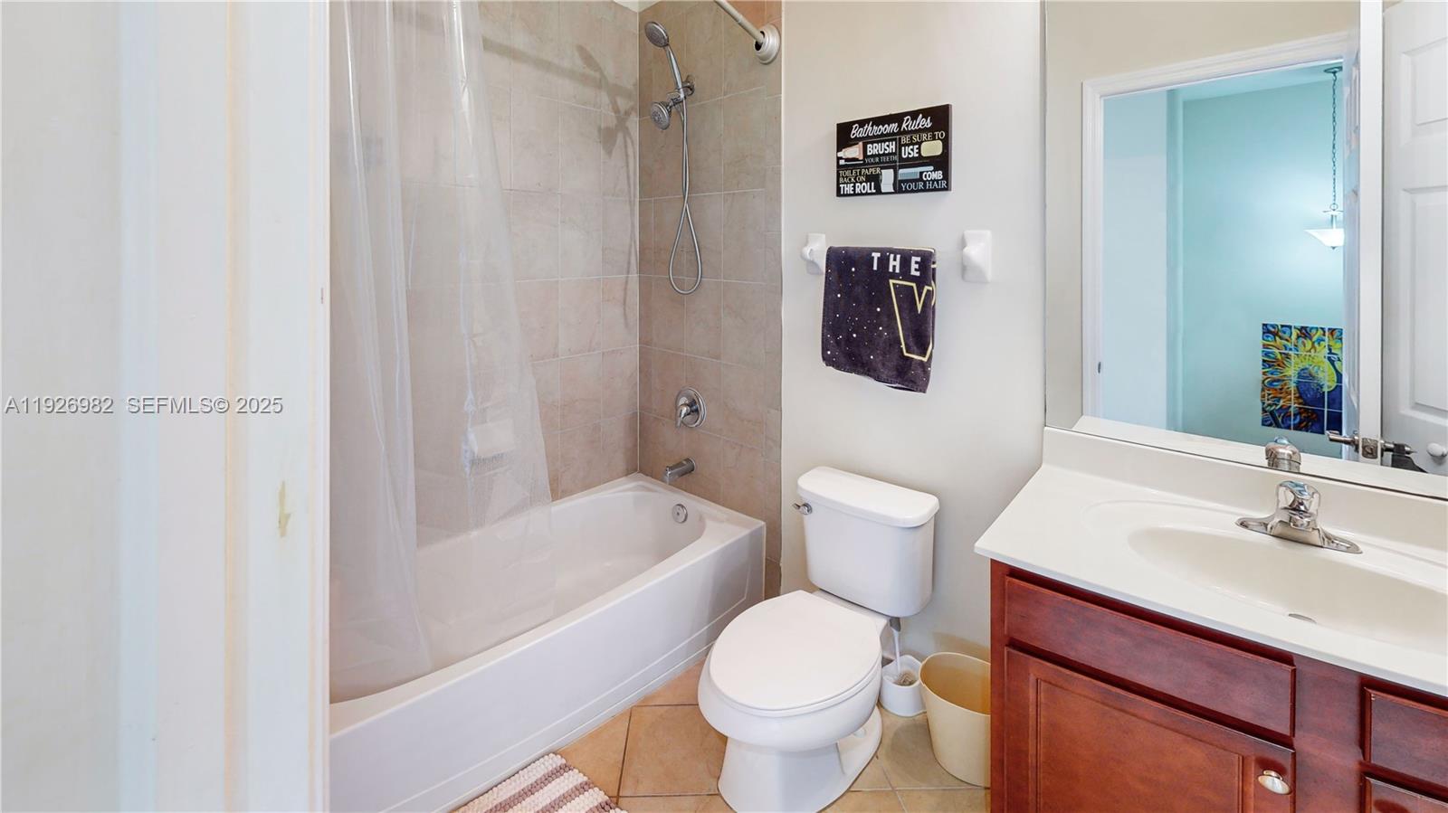 3218 Southeast 5th Court Homestead, FL 33033 - Photo 33 of 68 a bathroom with a sink toilet and bathtub