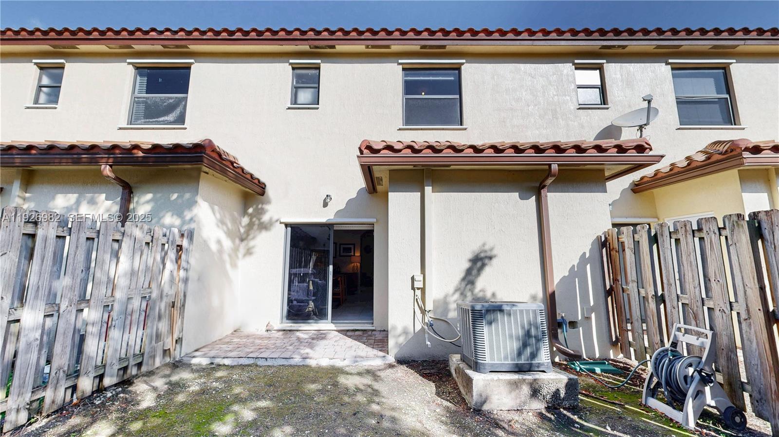 3218 Southeast 5th Court Homestead, FL 33033 - Photo 35 of 68 a front view of a house with patio