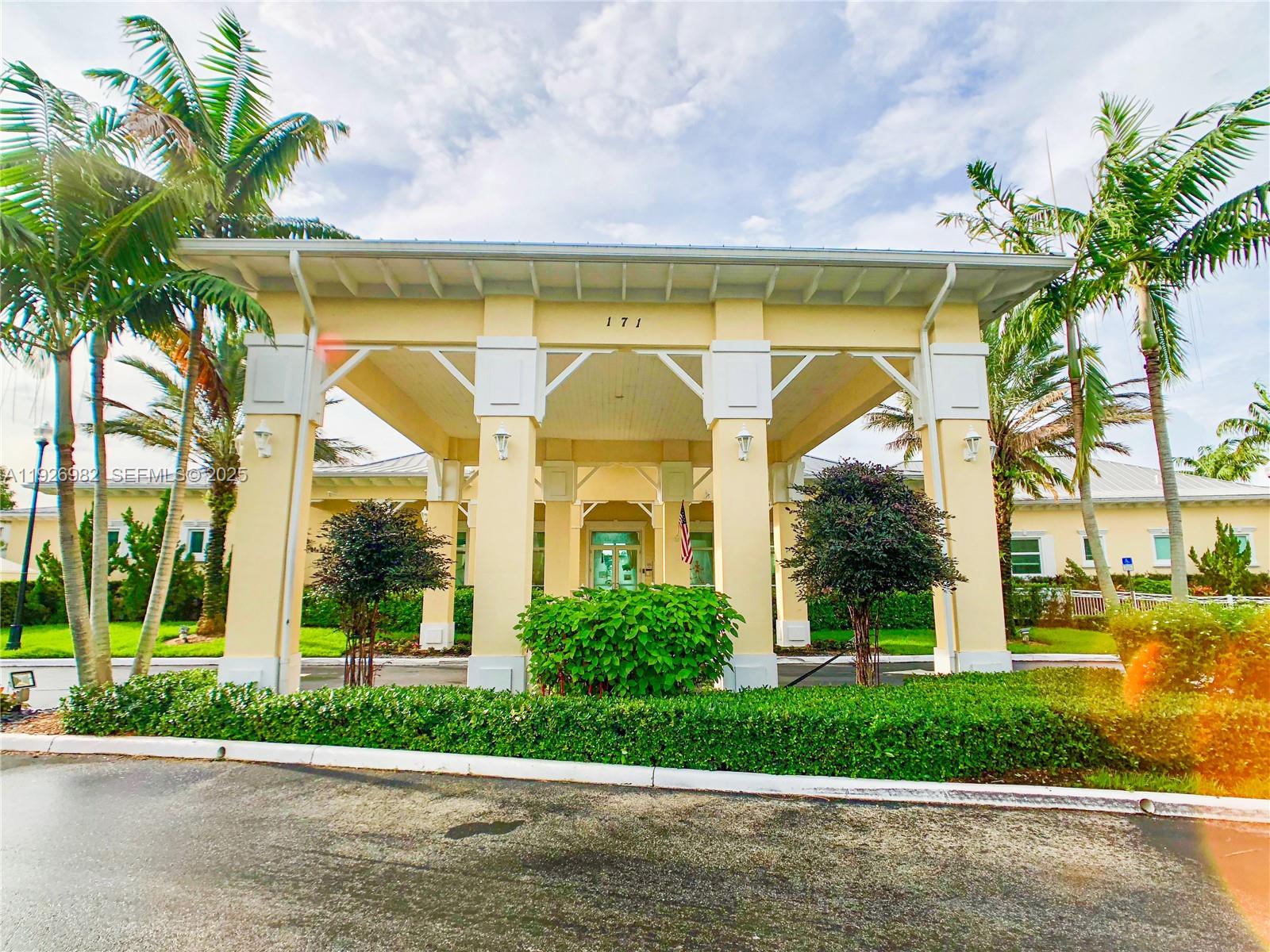 3218 Southeast 5th Court Homestead, FL 33033 - Photo 50 of 68 a view of a building with a garden