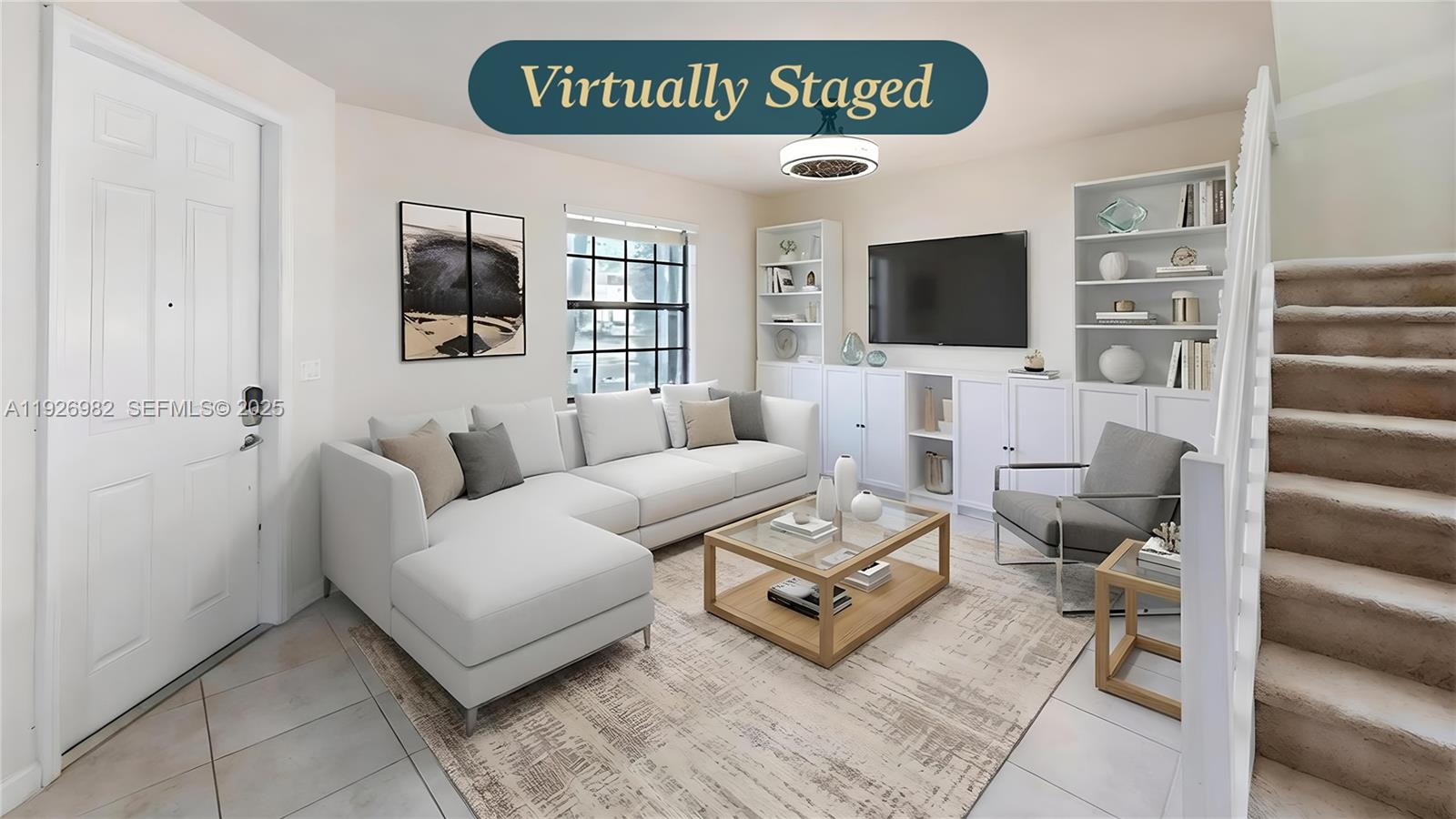 3218 Southeast 5th Court Homestead, FL 33033 - Photo 6 of 68 a living room with furniture a flat screen tv and a table