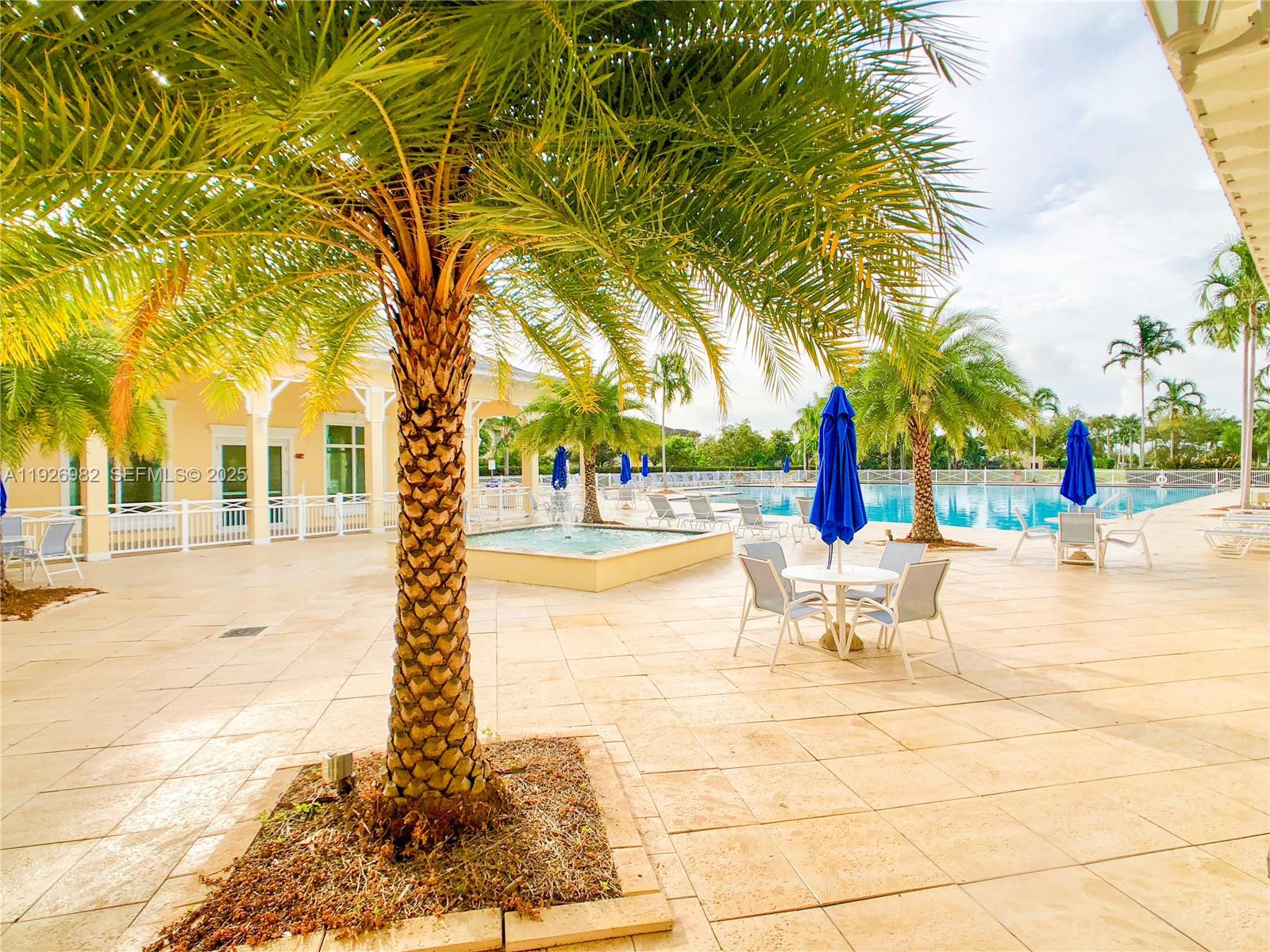 3218 Southeast 5th Court Homestead, FL 33033 - Photo 61 of 68 a view of a swimming pool with a patio