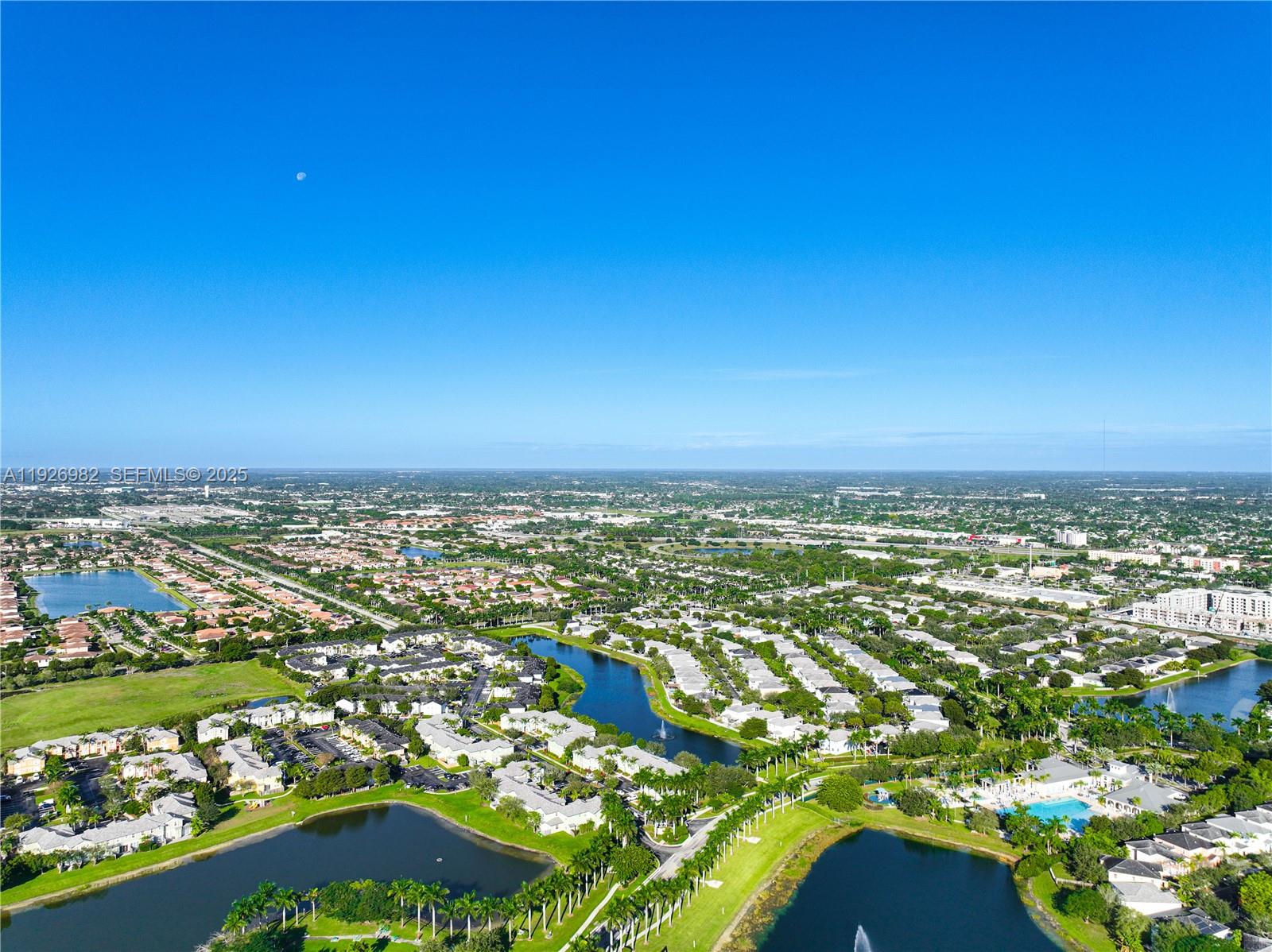 3218 Southeast 5th Court Homestead, FL 33033 - Photo 67 of 68 an aerial view of residential houses with outdoor space and trees