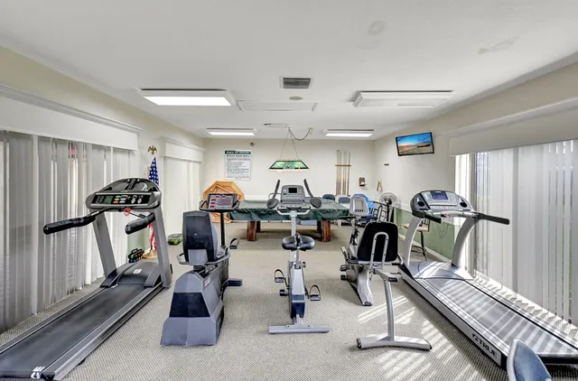 a view of a room with gym equipment
