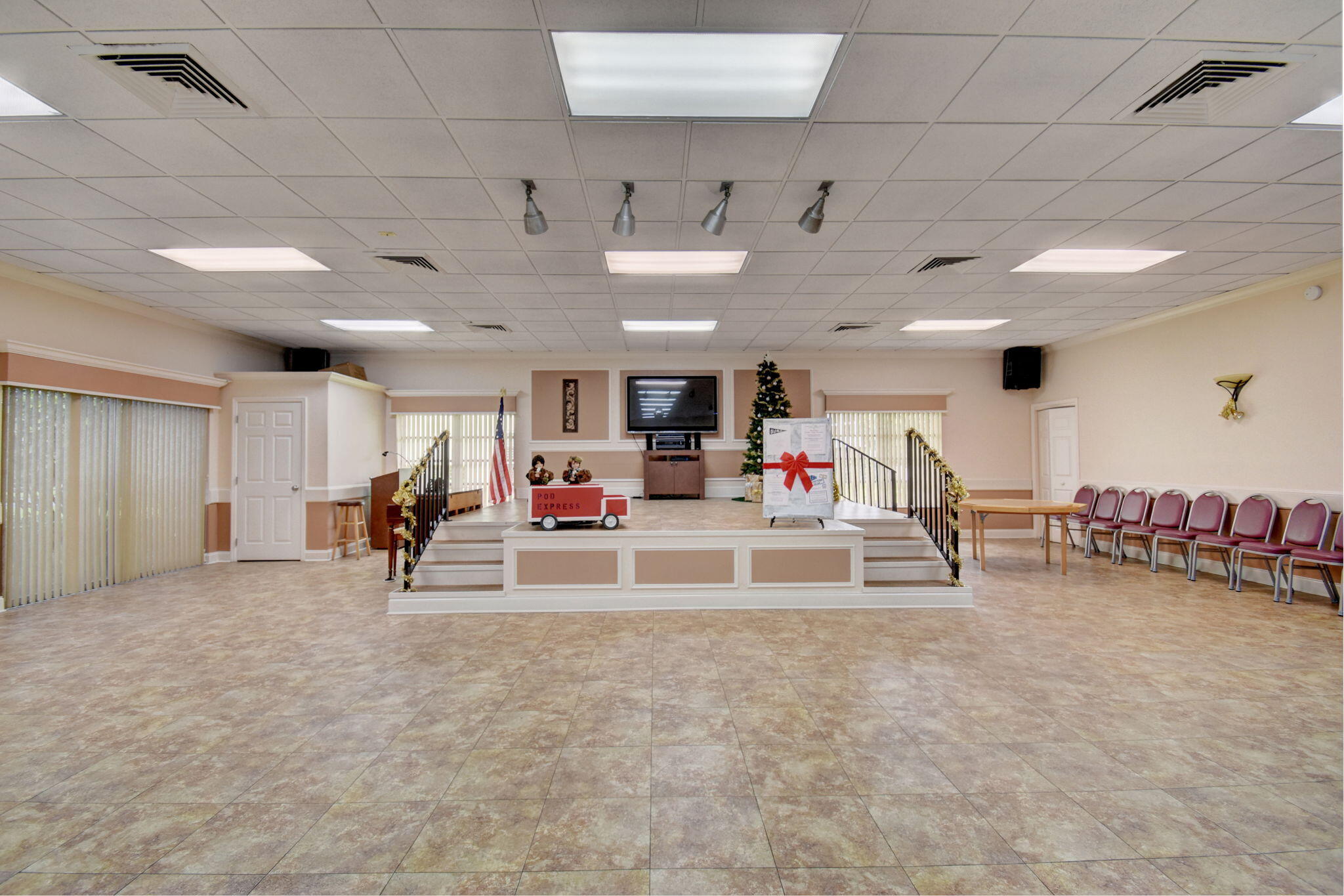 1141 Violet Terrace, Unit 202 Delray Beach, FL 33445 - Photo 42 of 46 a view of a room with gym equipment and a large window