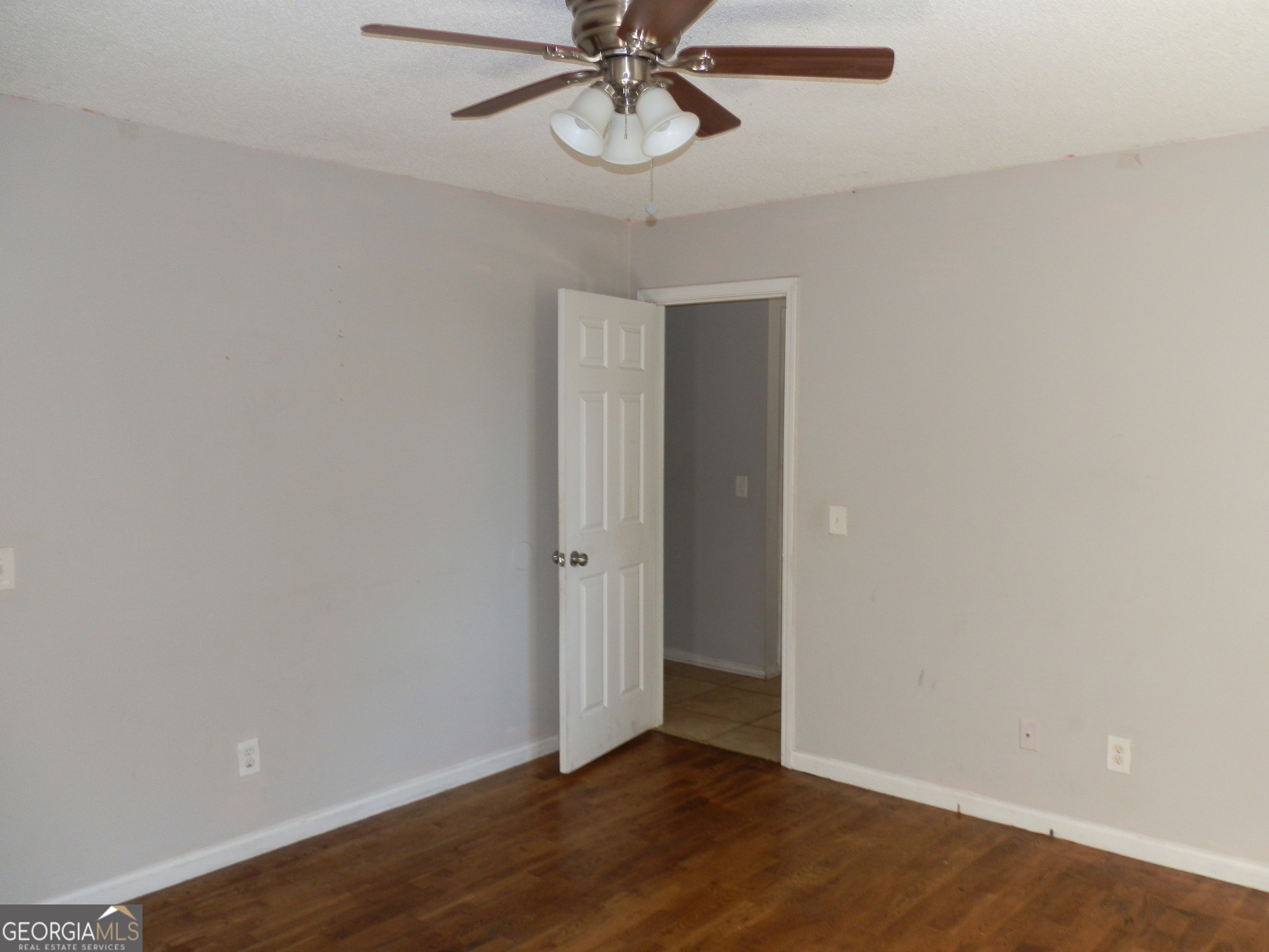 114 Lindsey Court Northeast Calhoun, GA 30701 - Photo 17 of 26 a view of an empty room with wooden floor