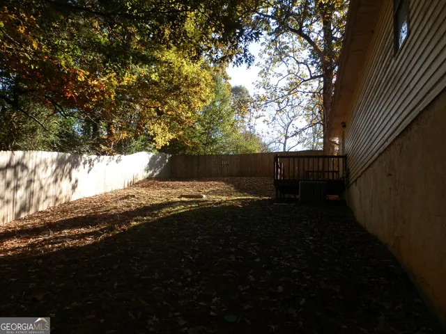 a view of street next to a yard
