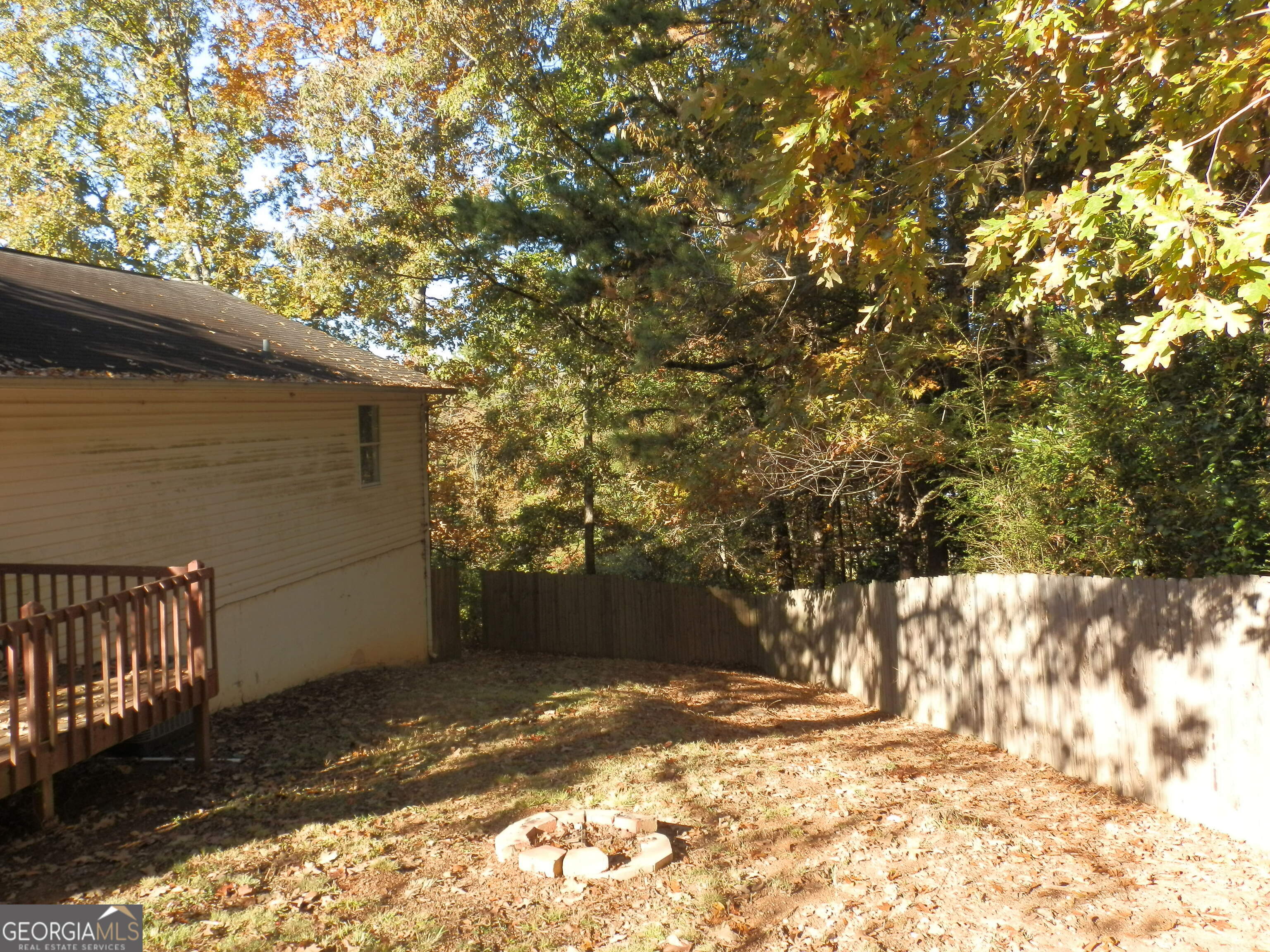 114 Lindsey Court Northeast Calhoun, GA 30701 - Photo 5 of 26 a view of a yard covered with snow in front of house