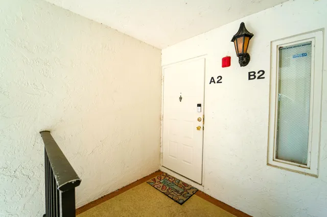 a bathroom with a shower and a sink