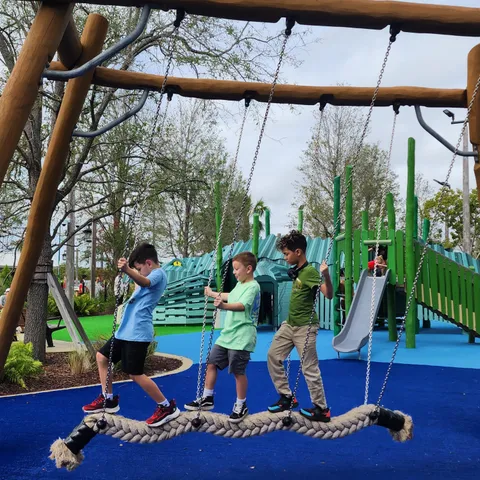 a room with lots of furniture and wooden floor