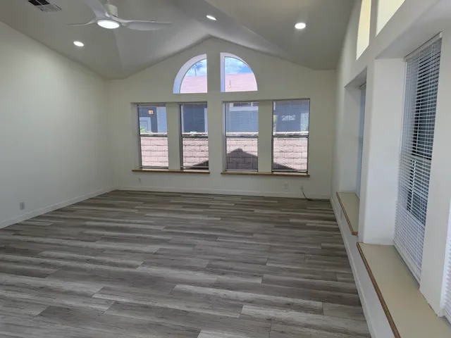 a view of an empty room and window