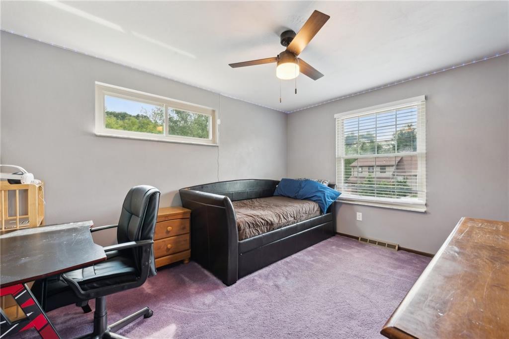 101 Edith Drive Hunker, PA 15639 - Photo 17 of 35 a living room with furniture and a window
