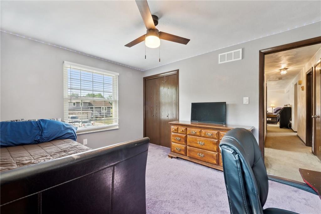 101 Edith Drive Hunker, PA 15639 - Photo 18 of 35 a living room with furniture and a flat screen tv