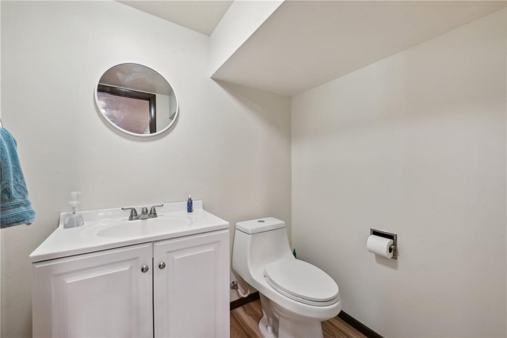 101 Edith Drive Hunker, PA 15639 - Photo 21 of 35 a white toilet sitting next to a bathroom sink