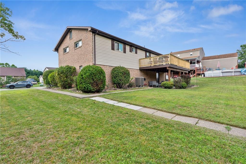 101 Edith Drive Hunker, PA 15639 - Photo 25 of 35 a front view of a house with a yard