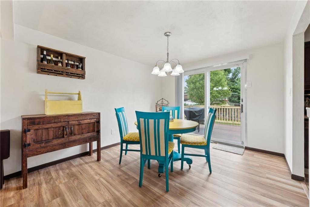 101 Edith Drive Hunker, PA 15639 - Photo 7 of 35 a view of a dining room with furniture window and wooden floor