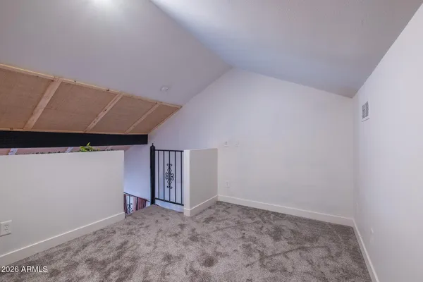 a view of balcony with furniture