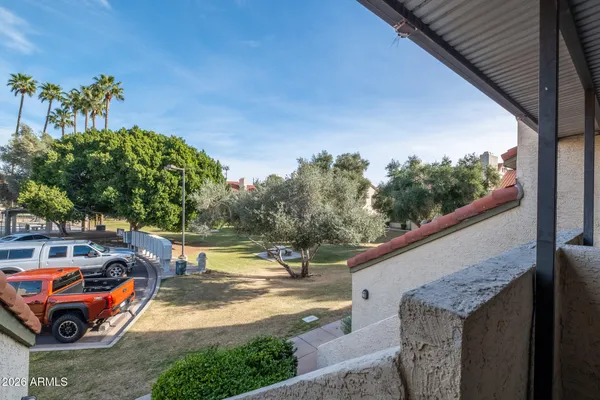 a view of a building with sitting area