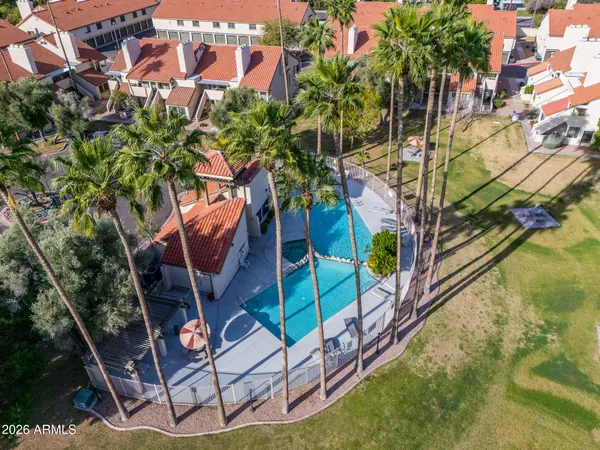 an aerial view of residential house and outdoor space