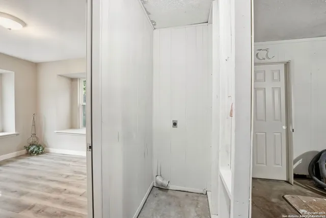a view of a room that has a door in it