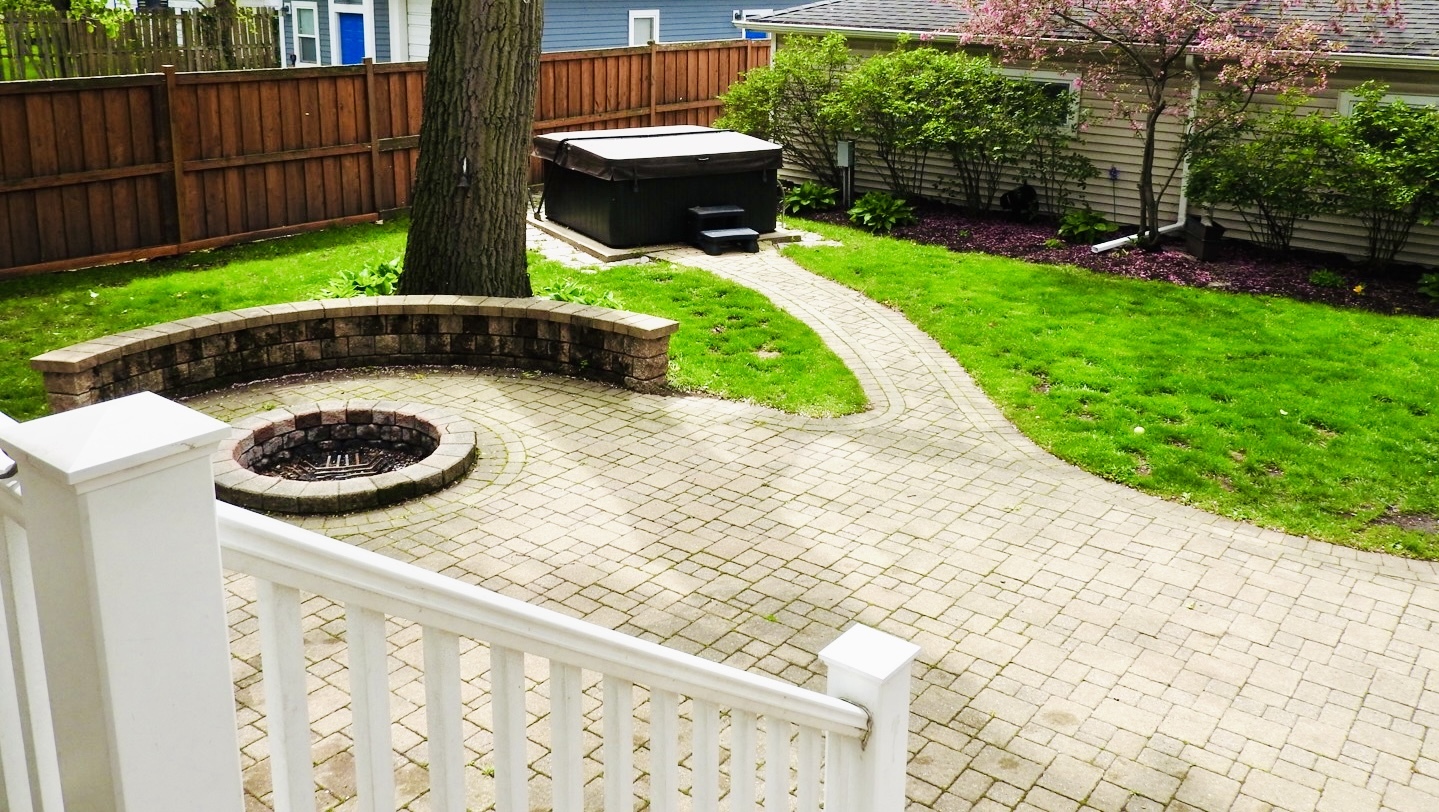68 Kimbark Road Riverside, IL 60546 - Photo 5 of 13 a view of backyard with table and chairs and wooden fence