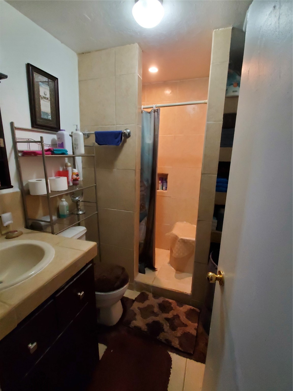 504 Pate Street Cleveland, TX 77328 - Photo 19 of 19 a bathroom with a sink and a mirror