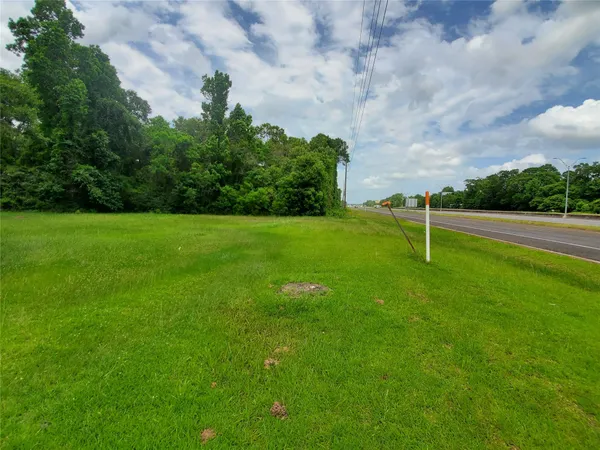 a view of an outdoor space and basketball court