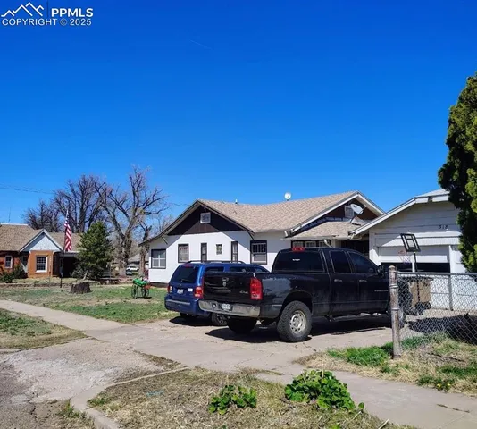 a car parked in front of a house