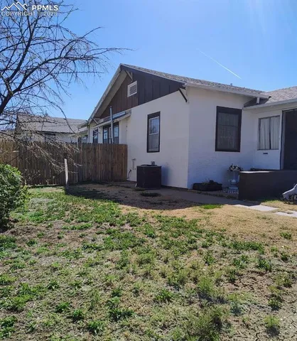 a house view with a backyard space