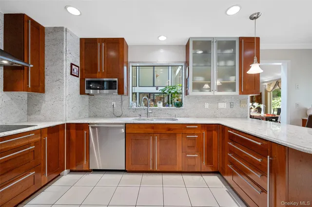 a spacious bedroom with a bed and a flat screen tv