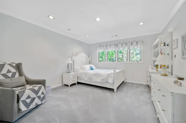 a bathroom with a toilet a sink and a mirror