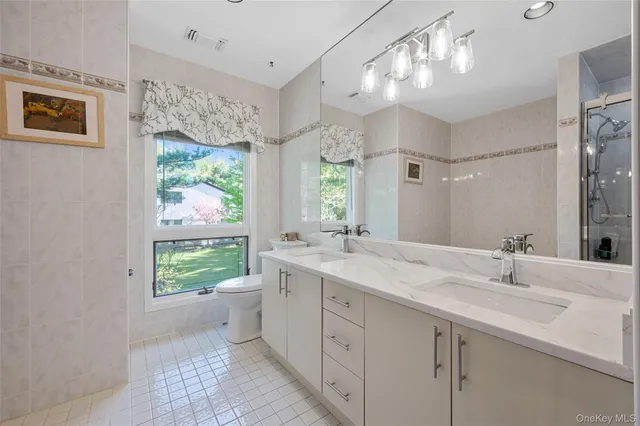 a view of a house with sitting area and a garden