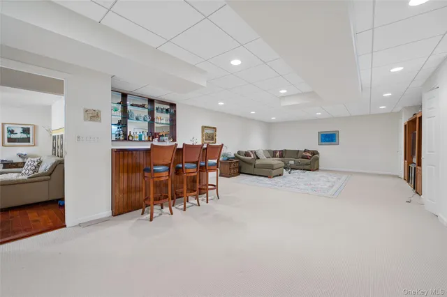 a view of a house with a outdoor space and parking