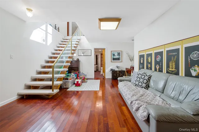 a view of a house with a tree in the background