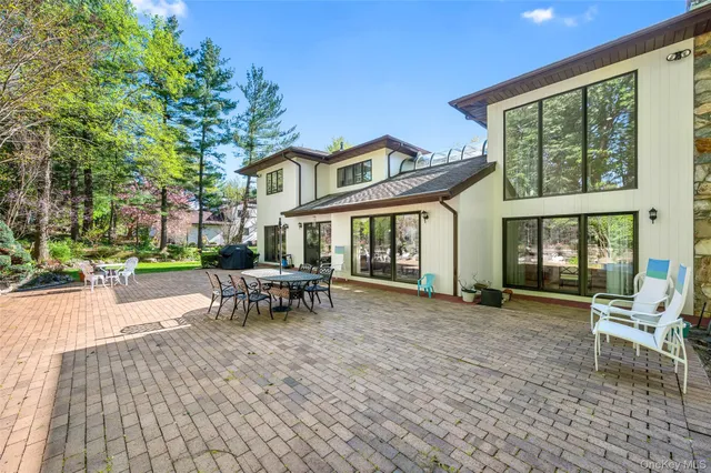 a view of a lake with a house in the background