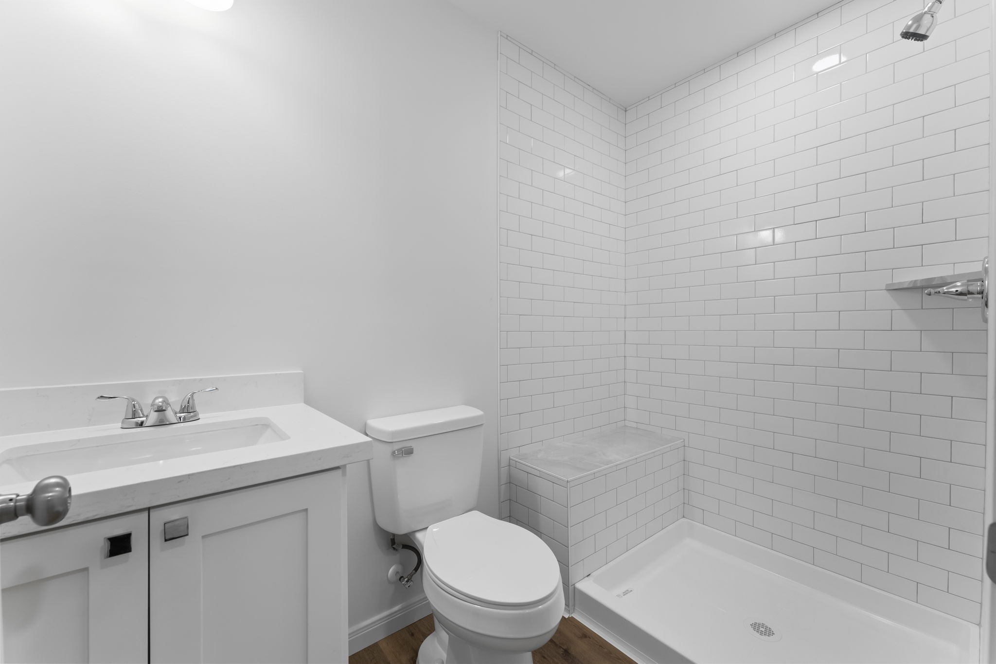 1507 North Durham Drive Houston, TX 77008 - Photo 18 of 35 a bathroom with a sink a toilet and shower