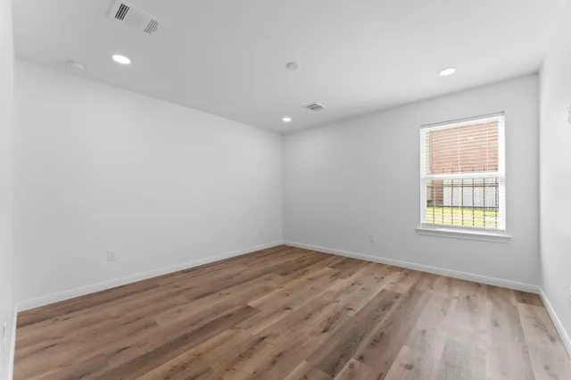 a view of an empty walk in closet