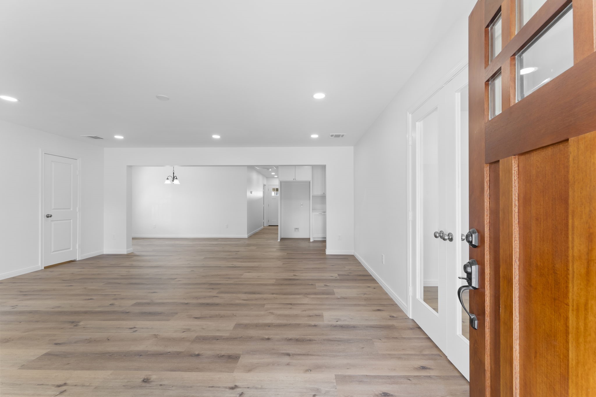 1507 North Durham Drive Houston, TX 77008 - Photo 5 of 35 a view of a hallway with wooden floor