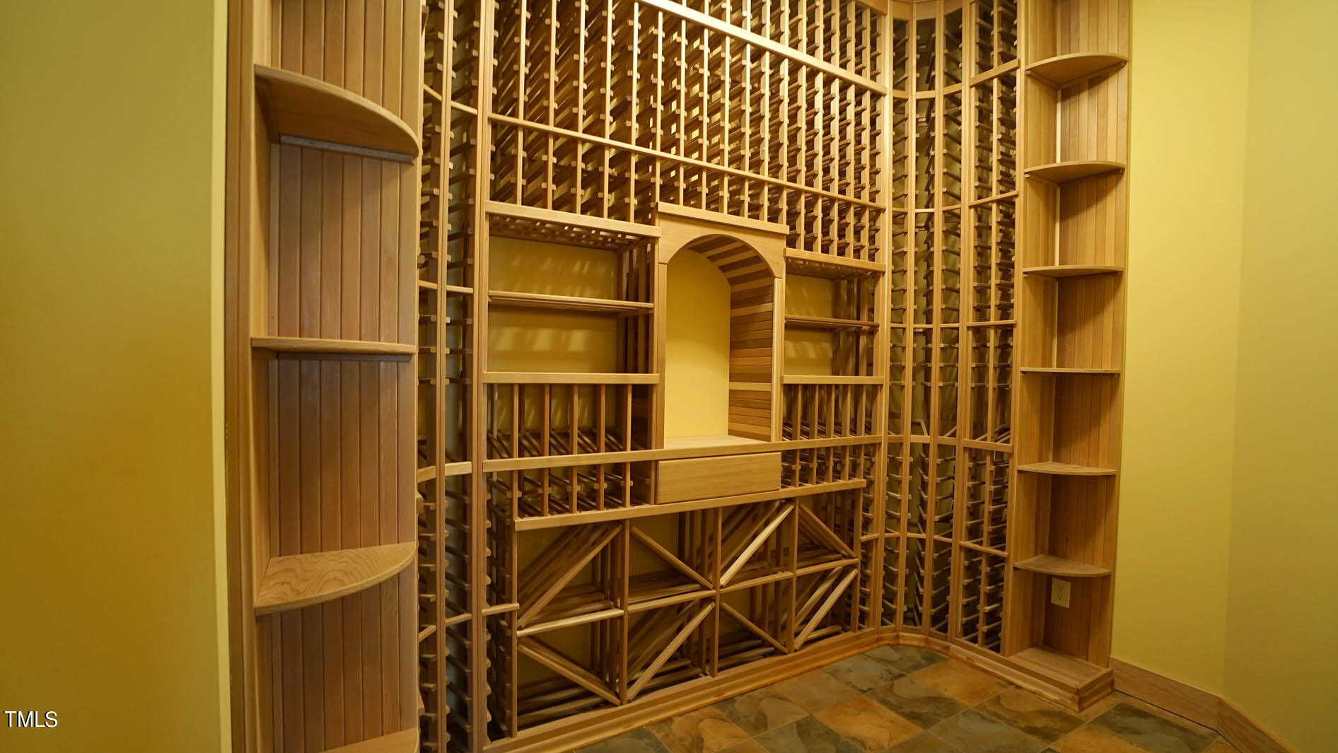 11216 Jonas Ridge Lane Raleigh, NC 27613 - Photo 50 of 75 Temperature controlled wine room with tasting area. Wine Cellar