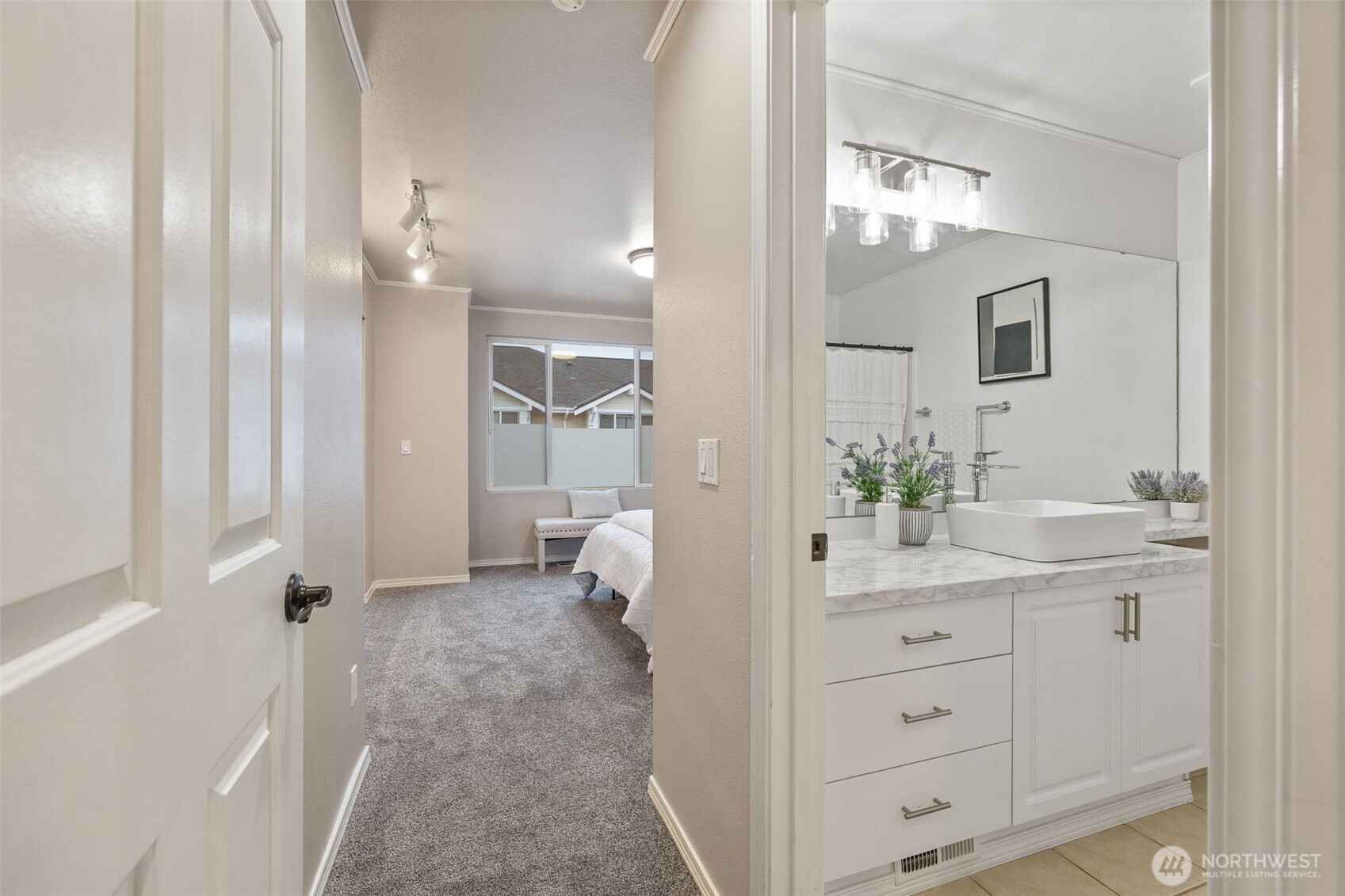 11895 Northeast 163rd Place, Unit 203 Bothell, WA 98011 - Photo 12 of 32 a spacious bathroom with a granite countertop sink a mirror and a shower
