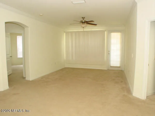 an empty room with a bathroom