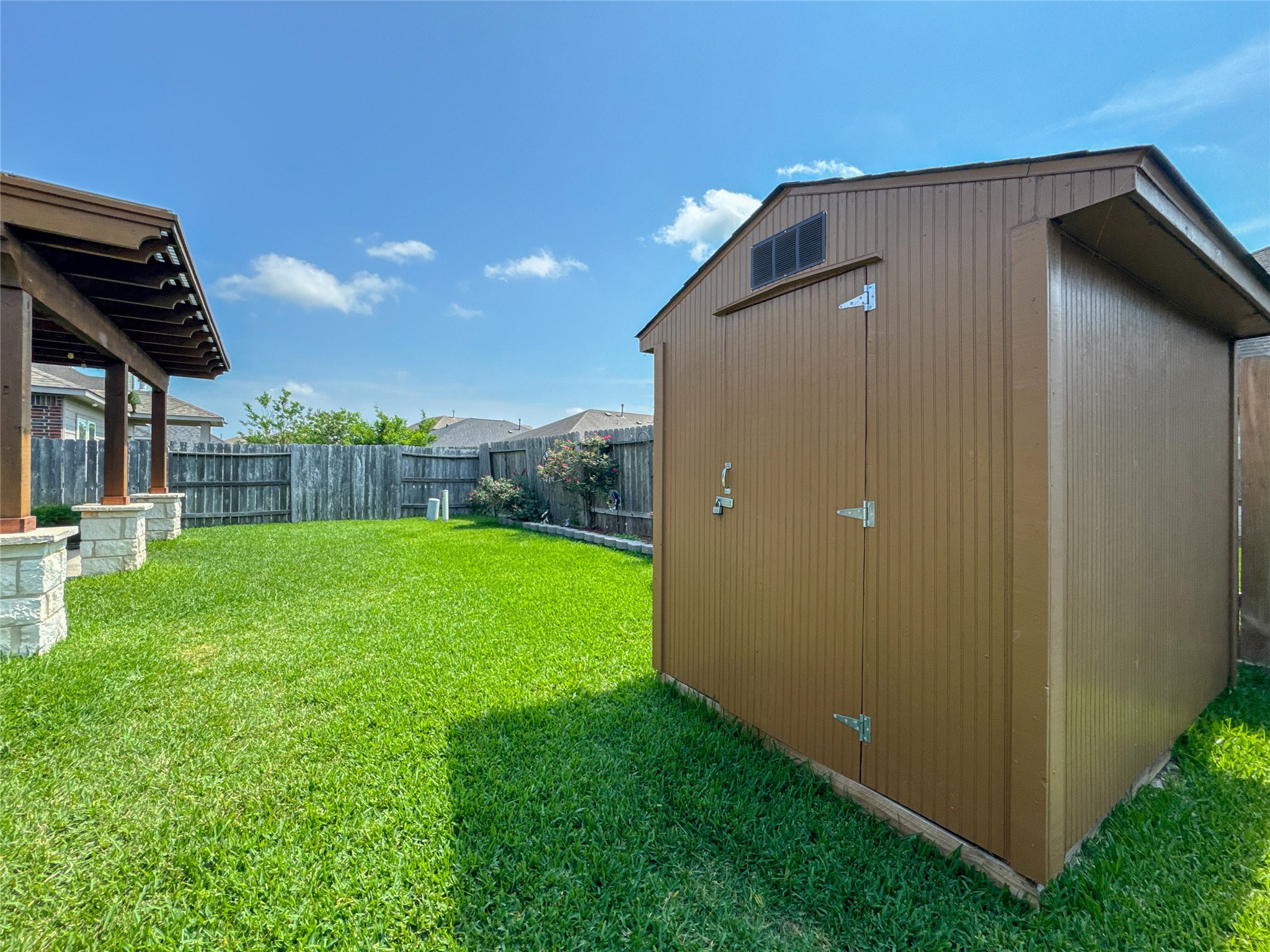 14 Palmdale Lane Manvel, TX 77578 - Photo 34 of 35 Storage for all your yard maintenance needs