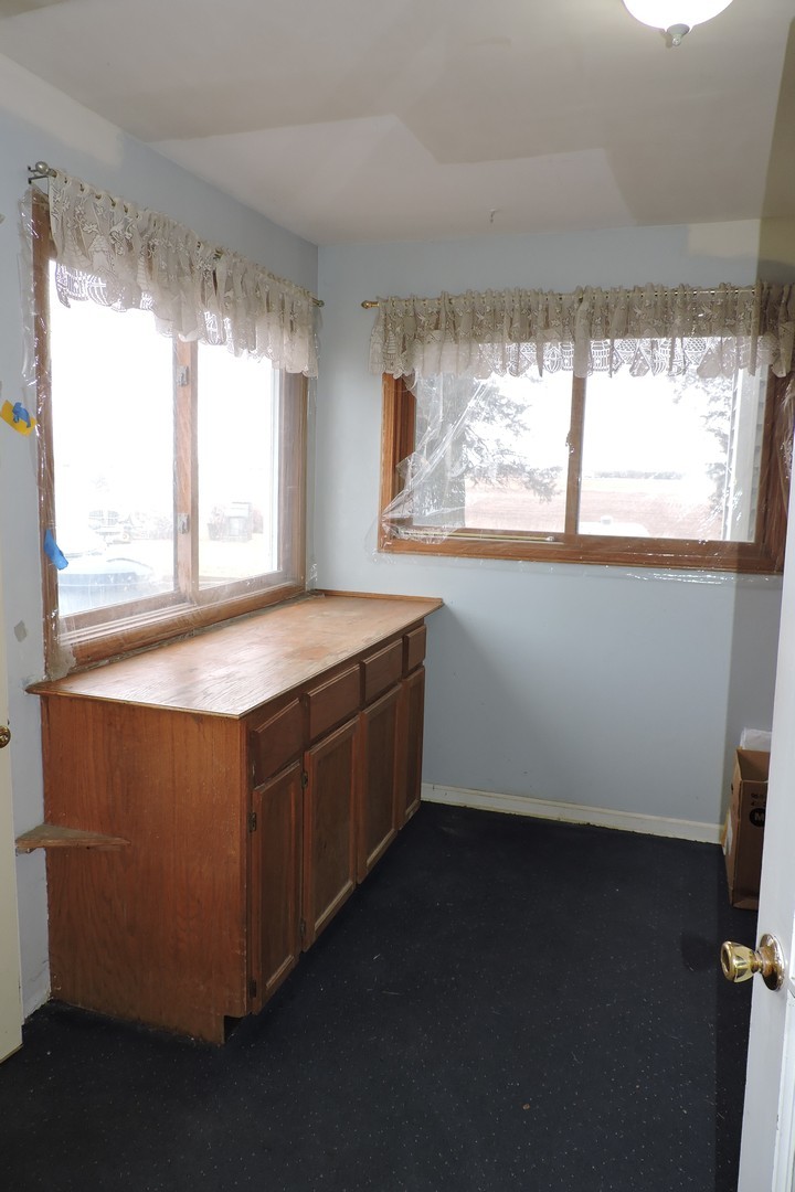 24960 South Scheer Road Monee, IL 60449 - Photo 11 of 26 a room with window and view of kitchen
