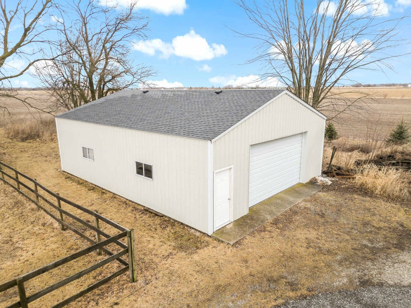 24960 South Scheer Road Monee, IL 60449 - Photo 6 of 26 a view of a house with a snow in the yard