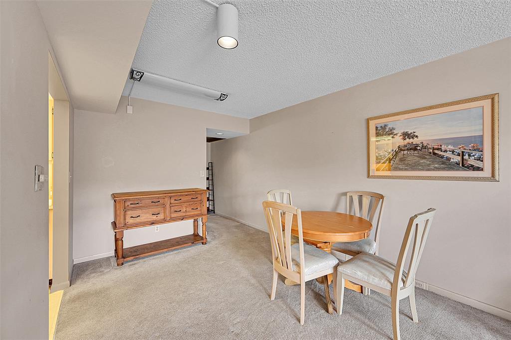 1901 Bermuda Circle, Unit F2 Coconut Creek, FL 33066 - Photo 12 of 26 a room with furniture and a table